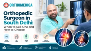 Orthopedic surgeon in South Delhi reviewing a knee X-ray with a patient at OrthoMedica